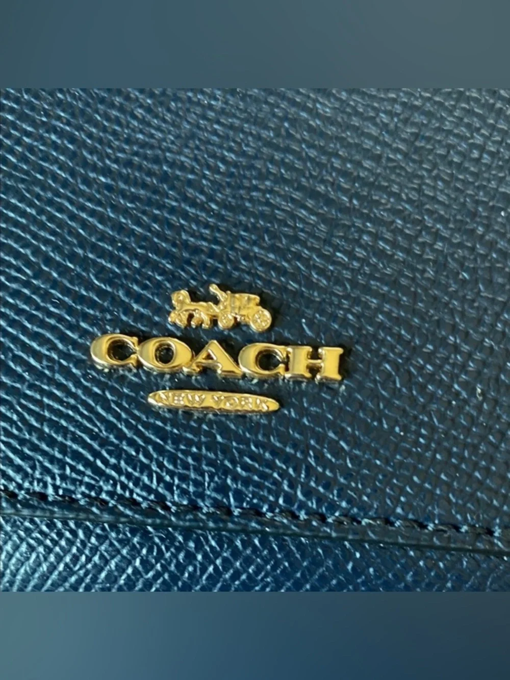 COACH Midnight Blue Leather Wallet.